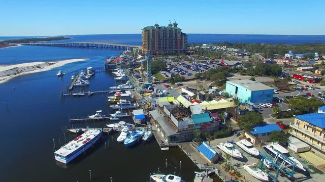 DESTIN, FLORIDA - FEBRUARY 2016: City harbor and coastline on a beautiful day. Destin is a major Florida destination.
