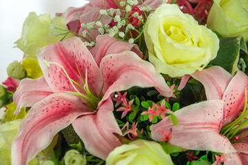 Rose fake flower and Floral background,rose flowers made of fabric,The fabric flowers bouquet,Colorful of decoration artificial flower