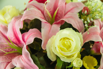 Rose fake flower and Floral background,rose flowers made of fabric,The fabric flowers bouquet,Colorful of decoration artificial flower