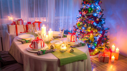 Gorgeous Christmas table setting during the frosty winter evening
