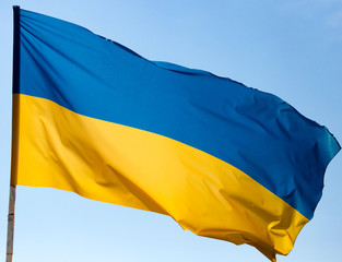 flag of Ukraine against the blue sky