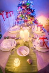 Moody Christmas table setting with Christmas tree