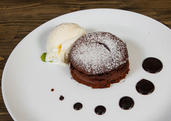 chocolate fondant on a wooden background.