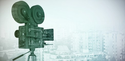 Composite image of black film reel camera with tripod