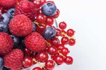 Red currant, rasberries, blueberries closeup
