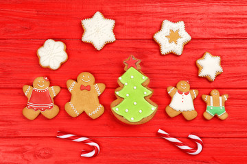 Tasty Christmas homemade cookies on color wooden background
