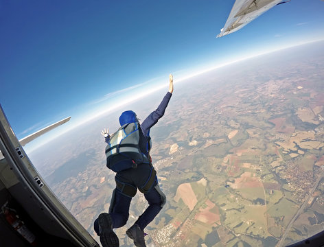 Parachutist jump from the plane.