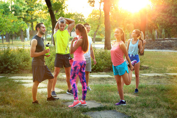 Fototapeta premium Group of young sporty people outdoors