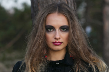 portrait of a girl with bright make-up.