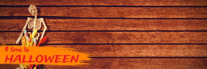 Composite image of graphic image of time to halloween text