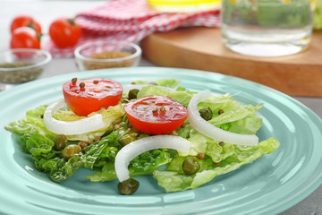 Delicious vegetable salad on table