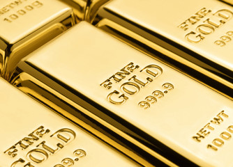 Rows of Gold bars. Gold bullion stack.