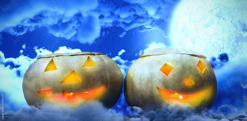 Poster composite image of illuminated jack o lanterns on table