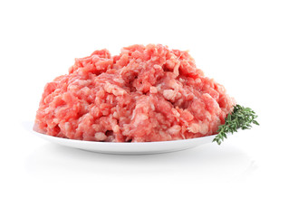 Plate with fresh minced meat on white background