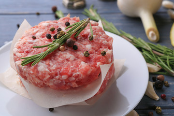 Plate with fresh minced meat, closeup