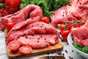Fresh raw meat on wooden board