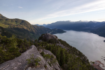 Beautiful sunset view of Howe Sound from the top of Chief Mountain. Taken in Squamish, North of Vancouver, British Columbia, Canada.
