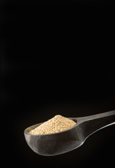 Amaranth seeds on the wooden spoon - Amaranthus