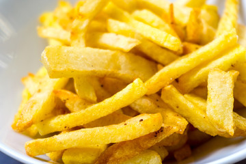 Golden French fries potatoes ready to be eaten