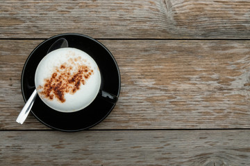 Coffee morning and Cup of coffee on wooden table.