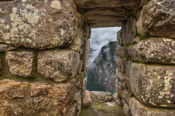View of the jungle through a stone window