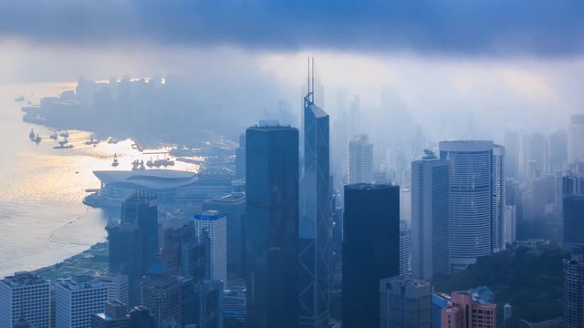 Aerial Silhouette Hong Kong Cityscape On Cloudy Day Over 4K Time Lapse (pan shot)