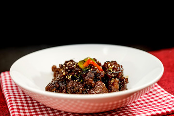 wok fried pork stir fry with sweet peppers and chinese vegetables