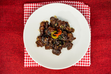 wok fried pork stir fry with sweet peppers and chinese vegetables