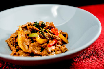 wok fried chicken stir fry with sweet peppers and chinese vegetables
