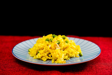 Homemade Chinese fried rice with vegetables and fried eggs