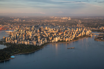 Naklejka premium Aerial view of the Downtown City Landscape during a colorful and vibrant sunset. Taken in Vancouver, British Columbia, Canada.
