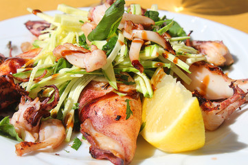 dish with grilled squid and salad