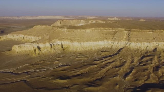 Cliff on the edge of the Ustiurt plateau, Kazakhstan. Aerial view