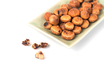 Chestnuts food with fork from rain forest