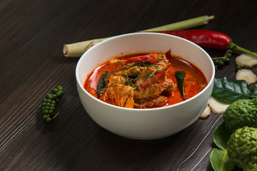Chicken curry with different spices on dark background, Delicius chicken panang curry, thai food, selected focus.