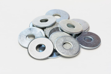 steel washers on a gray background closeup