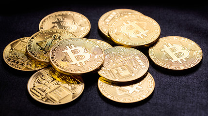 Bitcoins on black background