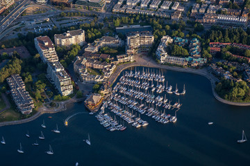 Fototapeta premium Aerial view of a marina in False Creek, Downtown Vancouver, BC, Canada.