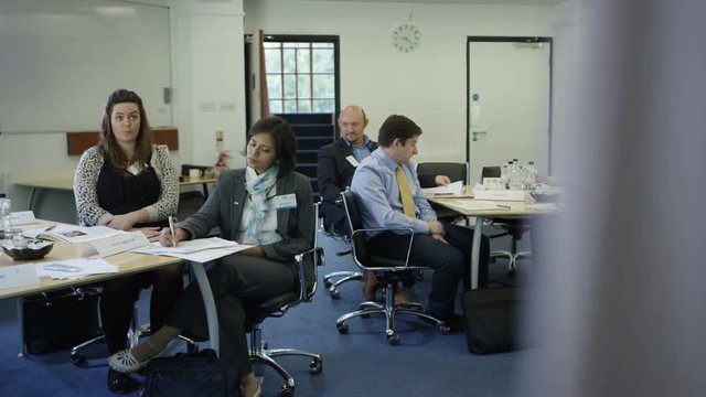  Real group at business seminar discussing issues & sharing information