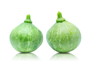 Two green fresh baby pumpkin isolated on white background with clipping path.