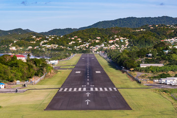 View down the runway of an island airport