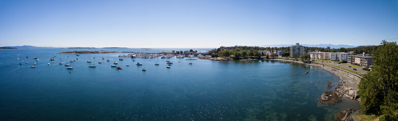 Fototapeta na wymiar Aerial panoramic landscape view of a beautiful rocky shore on Pacific Coast. Taken in Victoria, Vancouver Island, British Columbia, Canada.