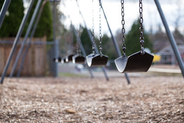 Swings in a playground.