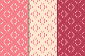 Set of floral ornaments. Cherry pink vertical seamless patterns