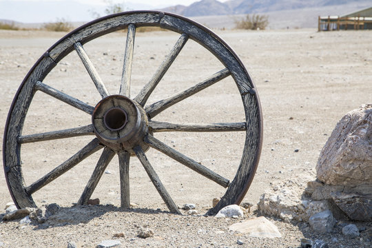 Abandoned cart wheel in Death Valley, California