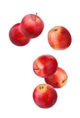 Fototapeta na wymiar Falling red apples isolated on white.