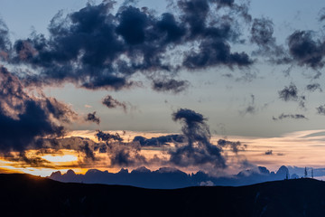 Dolomites skyline at sunset seen from the Pizzoc mountain, Veneto, Italy