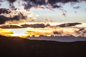 Sun shining on dolomitic ridges, Veneto, Italy