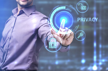 The concept of business, technology, the Internet and the network. A young entrepreneur working on a virtual screen of the future and sees the inscription: Privacy