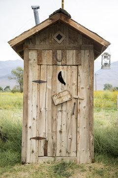 An old wooden outside toilet building 